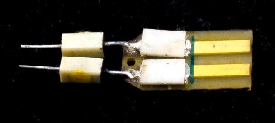 Punta con resistore di smorzamento sostituibile